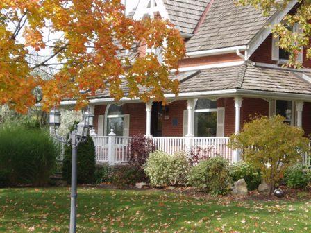 Of note is the large veranda with turned wooden columns.; Paul Dubniak, 2009.