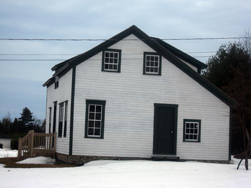 This image shows the north end façade of the residence; Village of Cambridge-Narrows