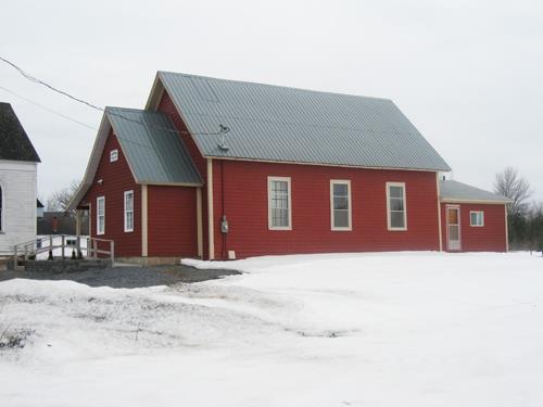 This image shows the side view of the former Temperance Hall, now the Cambridge-Narrows Regional Library; Village of Cambridge-Narrows