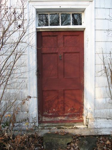 This image shows the central entrance of the residence; Village of Cambridge-Narrows