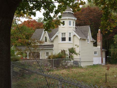 Featured is the two-and-a-half storey octagonal tower with a pagoda-like, two-tiered roof.; Paul Dubniak, 2009.