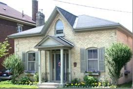 Of note are the buff brick voussoirs and quoins.; City of Brantford, n.d.