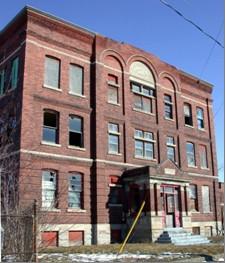 Of note is the three storey construction with flat roof.; City of Brantford, n.d.