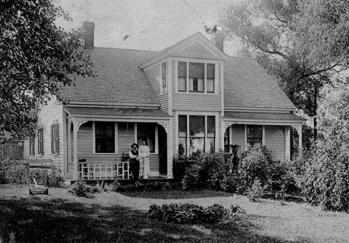The McLeod-Mundle House circa 1900, with David I. Mundle and his wife Jennie on the veranda; Private collection