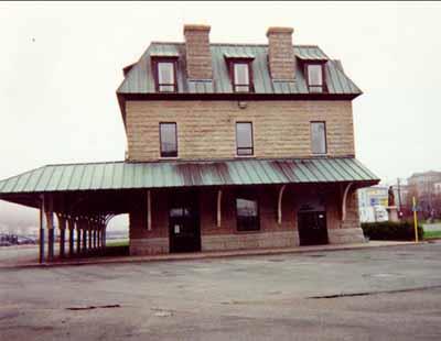 General view of the side elevation of the Newfoundland Railway Headquarters National Historic Site of Canada terminus building, 1997.; Public Works and Government Services Canada / Travaux publics et Services gouvernementaux Canada, 1997.