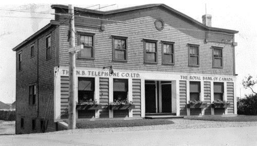 Photo of the building in 1939 at a time when it housed both the Royal Bank of Canada and the N. B. Telephone Co. Ltd.; Private collection