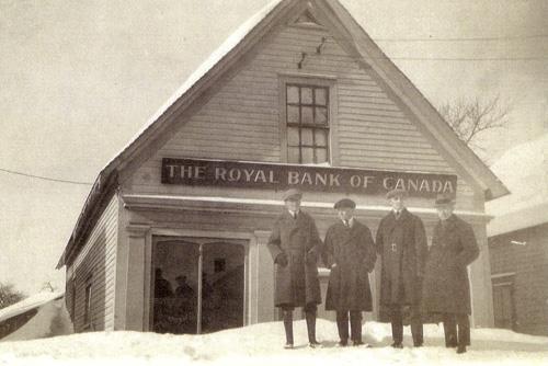 Photo of the former Royal Bank of Canada building in 1924. This building was located on the opposite side of Main Street from the location of the current building.; Private collection
