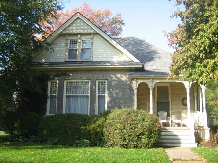 Of note are the decorative fishscale shingles on the gable.; Martha Fallis, 2008.