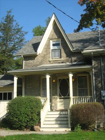 Of note is the entrance topped by a peaked gable.; Martha Fallis, 2008.