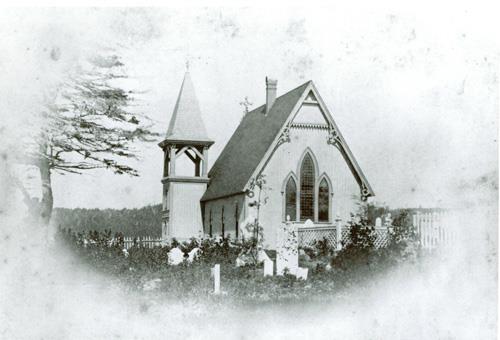 This historic image of the Church of Ascension in North Head, Grand Manan, shows the eastern wall of the church and it's spectacular stained glass windows.; Grand Manan Archives - Wooster image