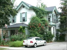 Of note is the bulls eye window in the gable and the decorative bargeboard.; City of Brantford, n.d.
