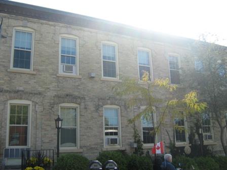 Of note are the slightly arched six-over-six paned windows.; Martha Fallis, 2008.