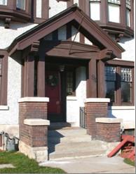 Featured is the portico with its gable roof, wooden brackets and square brick pillars.; City of Brantford, 2009.