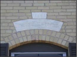 Featured is the marble stone inscribed with “OCCUPY TIL I COME”.; City of Brantford, n.d.