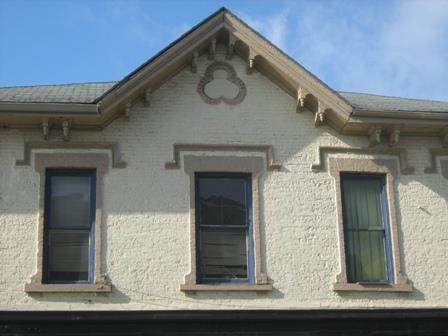 Of note is the trefoil in the Gothic gable.; Martha Fallis, 2008.