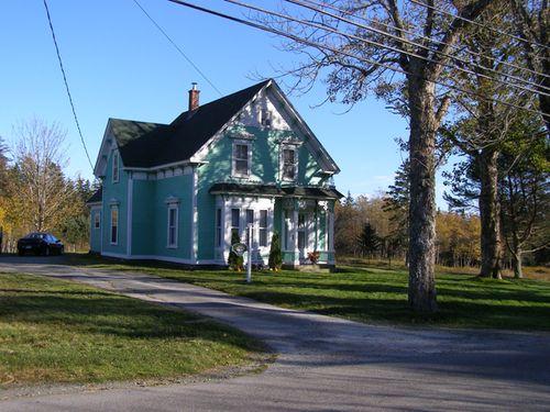 A northwest perspective view of the Enos W. Page House in its setting in the Town of Lockeport, NS.; Heritage Division, NS Dept. of Tourism, Culture & Heritage,2009