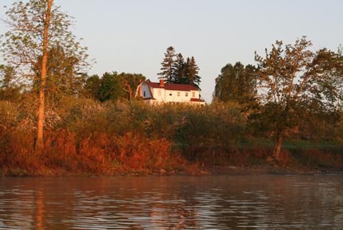 View from the river of the current residence on the Cossar Farm Site; Keith MacKenzie