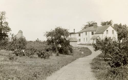 This historic image shows the Cossar Farm with Gage's pre-Loyalist house which burned in 1929; New Brunswick Museum Collection