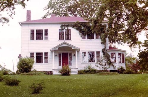 This image shows the front façade of the residence; Rebecca Watson