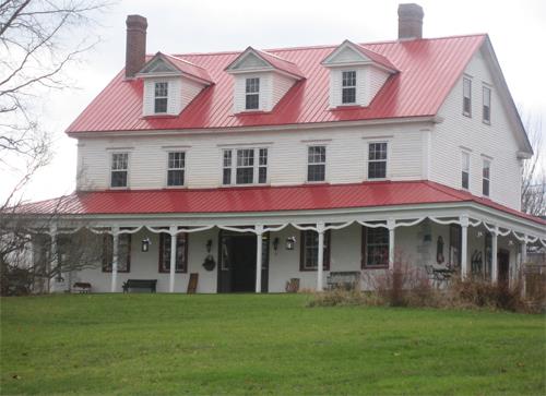 This image shows the contextual view of the residence; Village of Gagetown