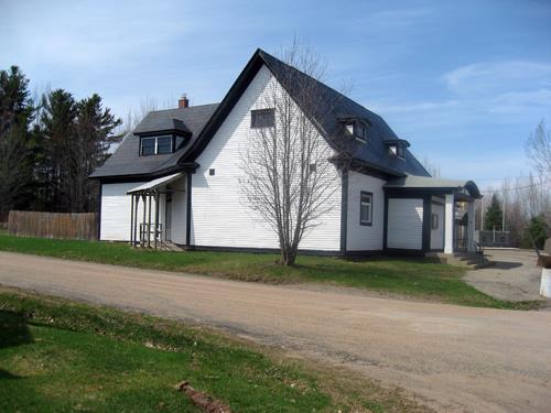 This image shows the south façade of the building; Village of Gagetown