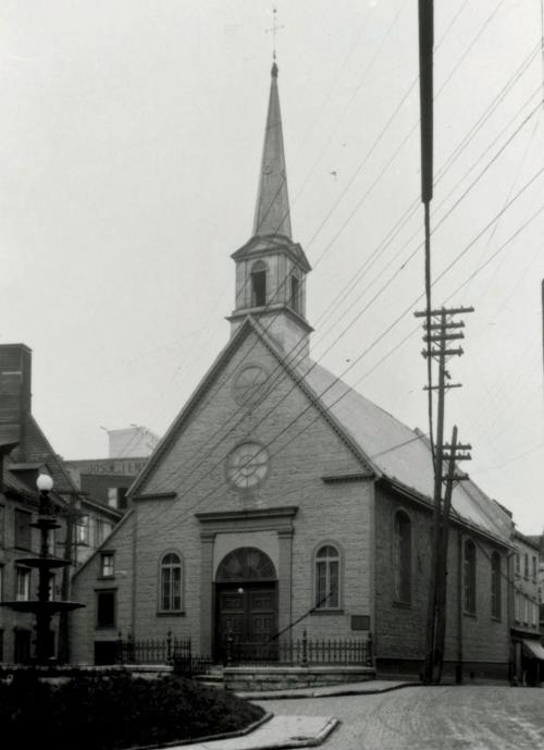General view of the Notre-Dame-des-Victoires Church National Historic Site of Canada, showing the thick stone masonry of the exterior walls and the rectangular volume,1925.; Parks Canada Agency/Agence Parcs Canada, National Archives Canada, 1925.