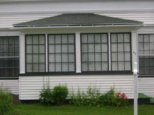 This photograph shows the multi-paned portico in the front façade, 2009; Town of St. Andrews