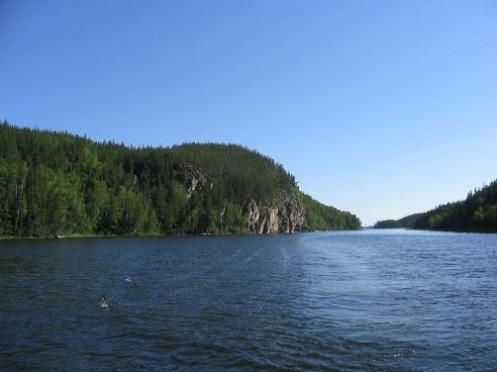 View of channel and an exposed rock face where some of the pictographs are located, 2004.; Government of Saskatchewan, Erin Ermel, 2004.