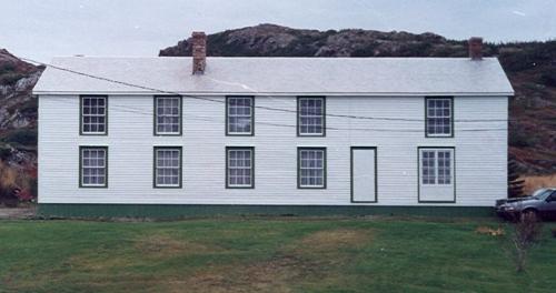 View of the front facade of Ashbourne Longhouse, Twillingate, NL.; HFNL 2010