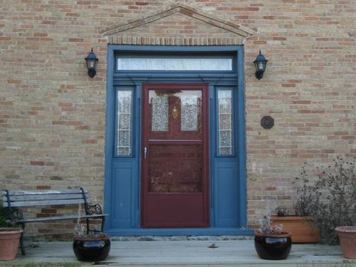 Contemporary view of Weatherhead House front entrance showing brick pediment detail.; MCL 2009