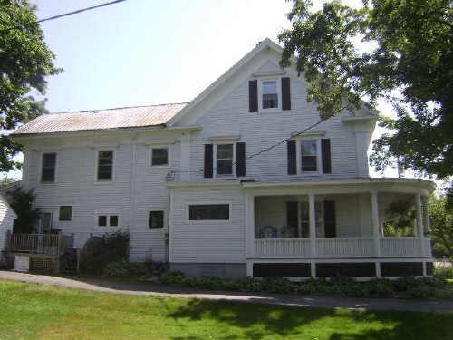 This photograph illustrates the side façade of the residence with the large eave returns and corner boards, 2009; Town of St. Andrews