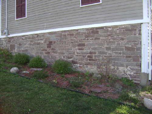 This photograph illustrates the large ascending foundation along Princess Royal Street, 2009; Town of St. Andrews