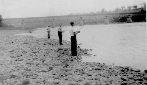 Many fisherman lined the shores during the salmon run. Hartland Salmon Pool is located adjacent to Hartland's Main Street.; Doris E. Kennedy