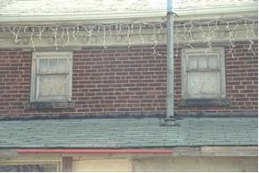 Of note are the brackets under the eaves.; Town of Milton, ND.