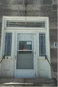 Of note is the entrance with decorative transom and sidelights.; Town of Milton, 2008
