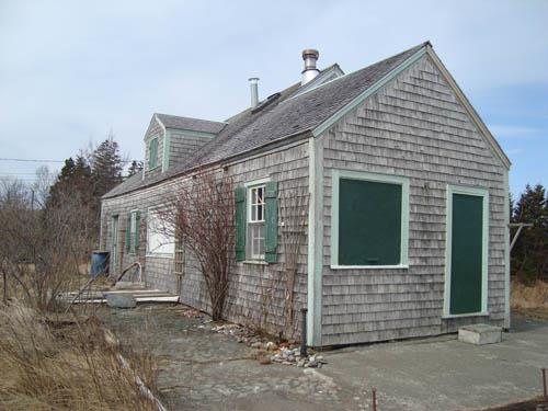 Image of the Grant House showing the large trees that add to its seclusion. ; Grand Manan Historical Society 2010