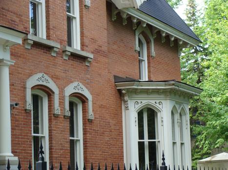 Detail of side facade bay window and eaves.; RHI2 2009