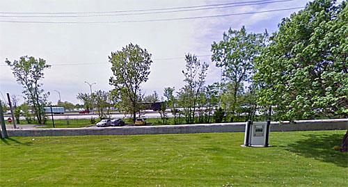 General view of the Fort Laprairie and the Historical Sites and Monument Board plaque showing its strategic siting on the western bank of the St. Lawrence River, 2010.; Google, 2010.