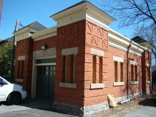 Detail shot of vehicular garage on east end of property; OHT, 2009