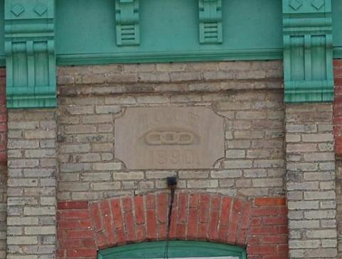 This engraved date stone on the second storey face reads “IOOF 1890”; Photographs taken by Dana Johnson, May 31st, 2010.