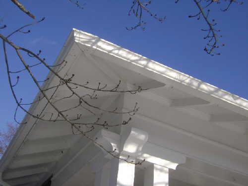 This photograph illustrates the distinguishing rafter tails below the eaves, 2009; Town of St. Andrews