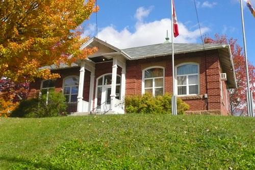 Since the plaster mill closed in 1980, this building has served as the Hillsborough Village Office and library. Built in 1907, this office replaced the original mill office built in 1855 at another location.; Village of Hillsborough