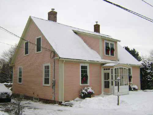 This photograph shows the side façade of the residence, 2009; Town of St. Andrews