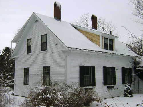 This photograph shows the side façade of the residence, 2009; Town of St. Andrews