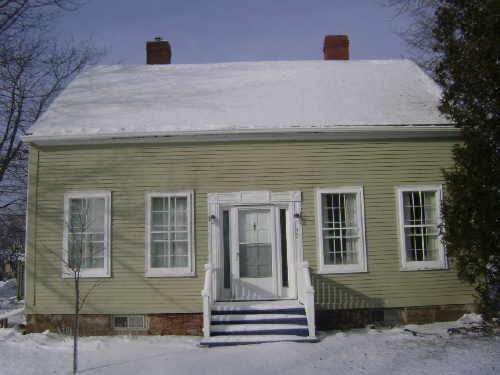 This photograph shows the contextual view of the residence, 2009; Town of St. Andrews