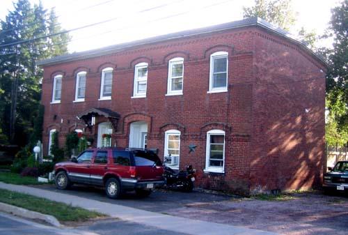 Of late 19th century construction, the house fronts onto the west side of Canada Street.; City of Fredericton