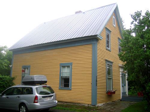 Side view of the wood-frame dwelling; City of Fredericton