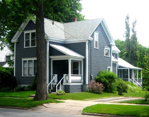 Image of a Scarr Cottage, showing variety of roof lines.; City of Fredericton
