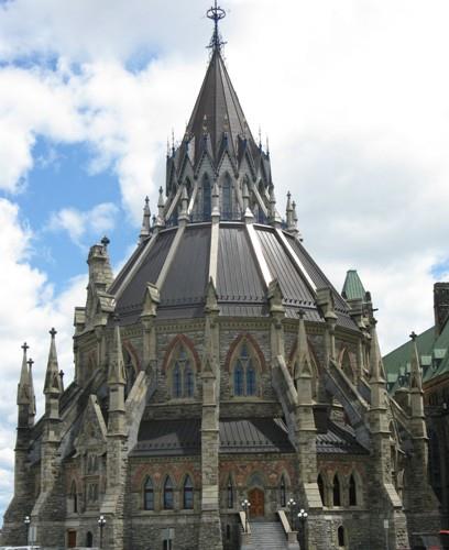 Exterior view of the Parliament Library showing its High Victorian Gothic Revival style, including its circular plan, chapter house-inspired design, 2010.; Parks Canada / Parcs Canada, Catherine Beaulieu 2010.