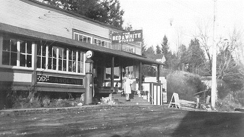 Red and White Store, Mr. Showler on the front steps, 1925-1929.; Maple Ridge Museum and Archives, P00417